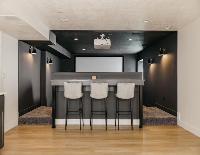 custom basement with home theater in custom Utah County home by 10X Builders