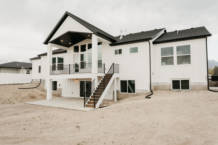 exterior of white, two story, custom home in Utah County, Utah by 10X Builders