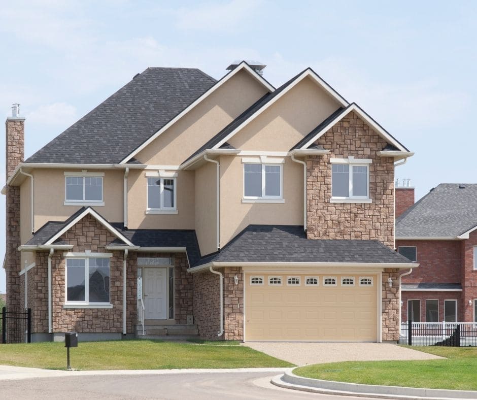 New building luxury suburban house in sunny summer afternoon