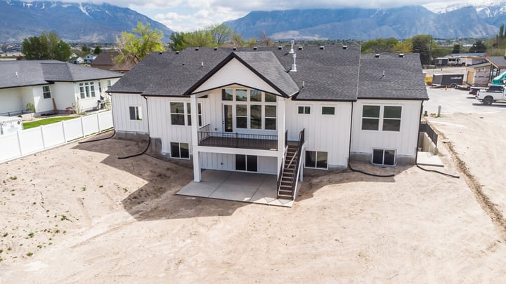 exterior of custom home during day in utah county by 10X Builders
