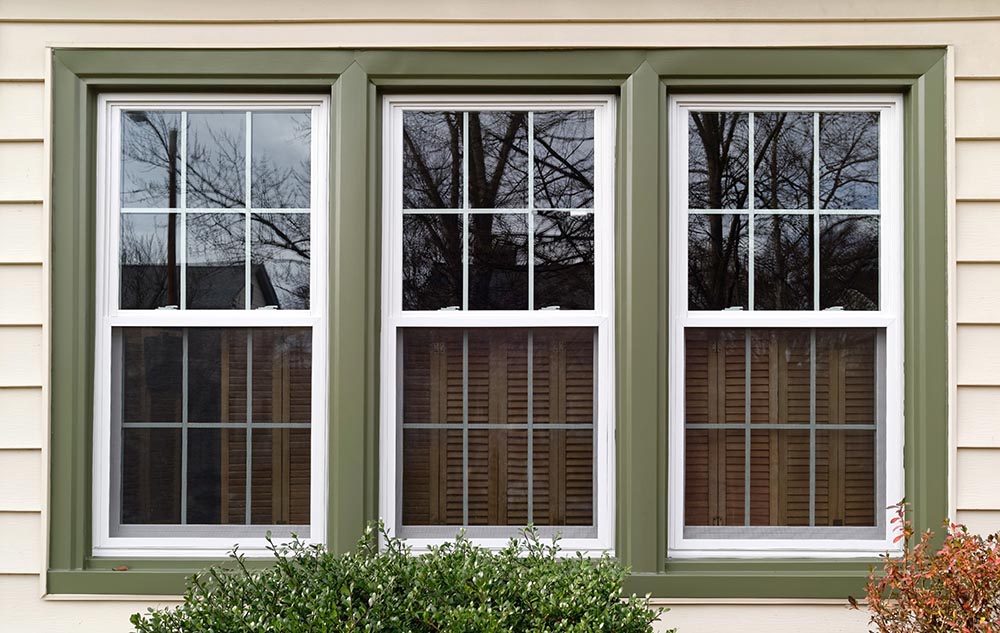 triple pane windows with olive green panes - photo by smart ext pros
